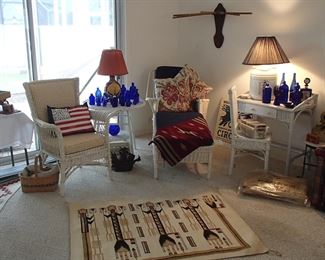 White wicker furniture, antique wall hanging clothes dryer, blue glass collection, other misc. 