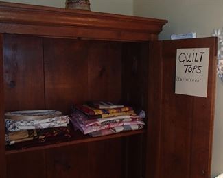 Quit tops in Armoire 