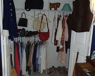 First closet filled with clothes 