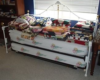 Daybed, variety of handmade quilts 