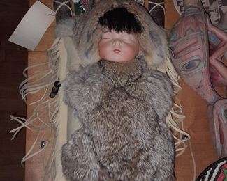 Native American Papoose Baby Cradleboard W/ Hand Painted Porcelain Head W/ Buffalo Fur Hair, Deer Leather, Rabbit Fur, & Glass Beads (Forebears Trading Co.)