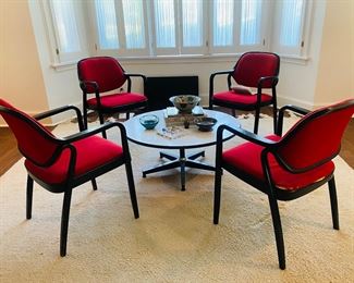 Knoll chairs, Eames table, Moroccan rug 