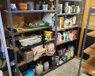 4 Metal book cases with garden supplies 
