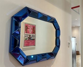 Romano wall blue colored glass mirror
$400
34 inches high 4 inches deep, 46 inches wide