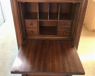 Previous chest in open position showing desk