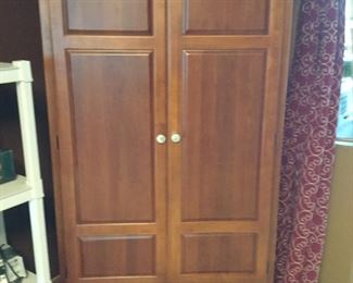 Armoire w/inside shelving & mirrored door