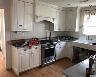 Cute kitchen with upgraded cabinetry and stainless steel appliances
