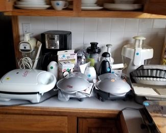 Cholpers,small grills,coffee maker.,corelle dishes,pie pans, waffle marker 
