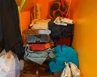 assortment of blankets clothes etc.