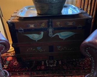 Painted trunk, large tin pot.