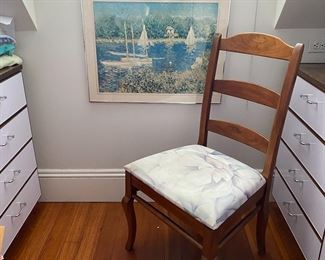Sailing print and chair.