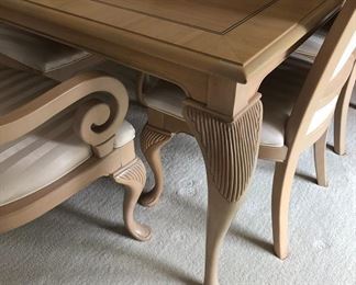 TABLE WITH 2 LEAVES AND 8 CHAIRS AND 2 ARM CHAIRS