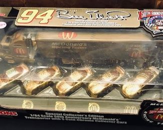 Bill Elliot McDonalds 50th Anniversary Transporter and 5 Car Gold Set.