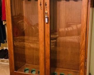 Large Wood Gun Cabinet w/ Glass Doors. Lockable. Top Condition. Holds 8 Guns and Lower Storage.