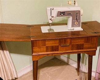 Mid-Century Model 660 Singer Sewing Machine and Cabinet.