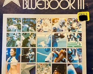 Vintage 1982 Dallas Cowboys Blue Book. Autographed by HOF Running Back Tony Dorsett. Card Included.