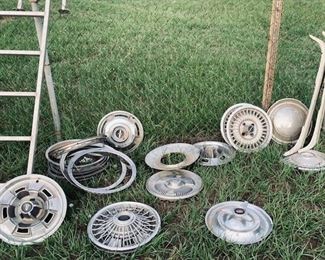 Good Selection of Auto Accessories including Vintage Hubcaps and Hubcap Sets.