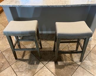 Two padded bar stools
