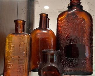 64. Amber Glass Bottles Collection (Tallest 12")