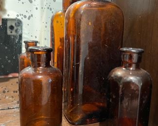 64. Amber Glass Bottles Collection (Tallest 12")