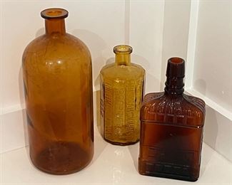 64. Amber Glass Bottles Collection (Tallest 12")