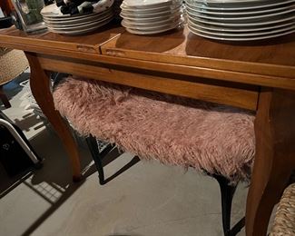 76. Domain Game Table to Dining Table (39.5" x 39.5" x 31") w/ 2-19.5" fold-out leaves                                                             77. Bench w/ Pink Faux Fur Upholstery (32" x 16" x 21")