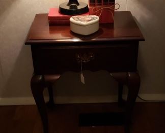 Queen Anne side table, lamp, books