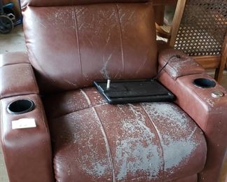 Electric recliners which has peeled fabric, deer camp?