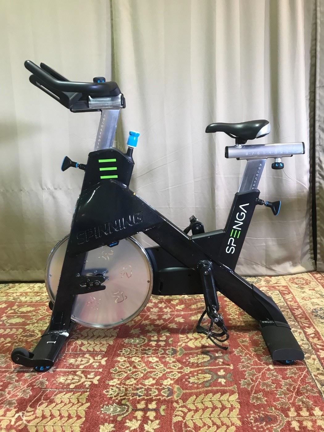 1 OF 30 PRECOR SPINNING CYCLES WITH CONSOLES. MODEL: SBK 867/869