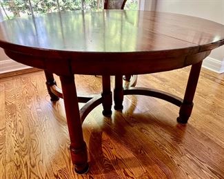 49. Round Dining Table w/ Distressed Finish 2-15" leaves and Protective Pads (56" x 56" x 31")
