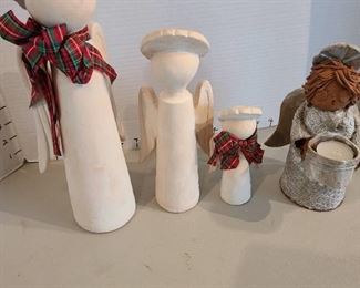 Clay angels, tallest is 13"