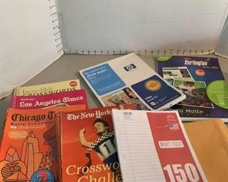 Paper, crossword books, and envelopes
