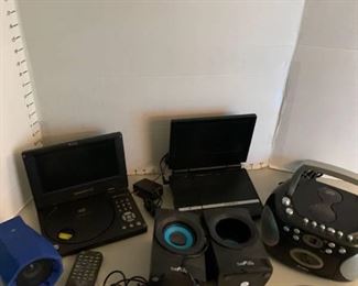 Portable DVD players, mini boom box and speakers. chargers missing
