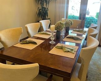 Custom Century Furniture Dining Table & Swaim Chairs - $6,100.00

Set includes dining table, 6 side chairs and 2 end chairs.

Table is made from maple wood

Table dimensions: 94.75"L x 42.74"W x 30"H (including one leaf)

Leaf measures 22"

Side chair dimensions: 22"W x 24"D x 38"H x 20" seat height

Arm chair dimensions: 24.5"W x 24"D x 38"H x 20" seat height
