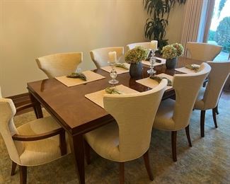 Custom Century Furniture Dining Table & Swaim Chairs - $6,100.00

Set includes dining table, 6 side chairs and 2 end chairs.

Table is made from maple wood

Table dimensions: 94.75"L x 42.74"W x 30"H (including one leaf)

Leaf measures 22"

Side chair dimensions: 22"W x 24"D x 38"H x 20" seat height

Arm chair dimensions: 24.5"W x 24"D x 38"H x 20" seat height
