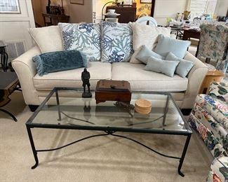 sofa is in excellent condition and comes with the four large throw pillows on the back