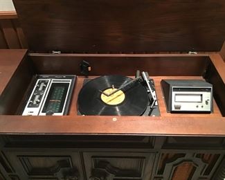 Stero record player, Am/Fm Radio and tape player in cabinet 