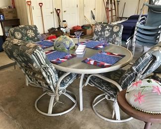 Patio table and chairs with pads