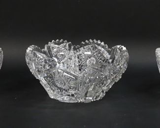         11	3 Cut Glass Bowls	3 cut glass bowls. Largest 3 3/8"H x 8 1/8"-diameter. All with chips and fleabites to rims and throughout.
