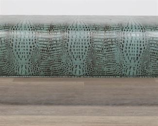         42	Hollywood Regency Style Faux Crocodile Bench	"Hollywood Regency style faux crocodile skin bench produced by the Cambridge Collection. Conover, NC, 21st century.  Manufacturer's tag on underside of bench. Wear, nicks, and scratches to wood on tapered legs. Small loss to faux skin on top of bench. Small depressions to cushioning of bench.

56 1/2"" W x 18"" D x 19"" H."
