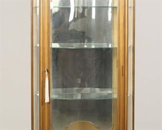         51	Louis XV Style Vitrine	"Louis XV style vitrine. 20th century. Gold tone wood, three glass shelves, painted floral motif. Key with tassel is included. Chips and fleabites to glass on edges of shelves. Wear and marks to felt lining on bottom of vitrine. Small scratches and scuffs to wood on feet of vitrine. Light scuffs and scratches to glass of doors, sides and shelves. Repairs to carved scrollwork on top of vitrine.

28 3/4"" W x 14"" D x 71 1/2"" H."
