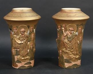         65	Pair of Satsuma Hododa Porcelain Vases	Pair of Satsuma Japanese porcelain Immortals vases. Red and gilt Satsuma Hododa marks to the underside. Each 9 3/4"H. Crazing, minor losses and scratches to gilt decoration on both; rim and top repaired on one.
