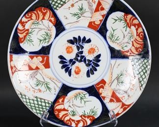         71	Japanese Imari Charger Yamatoku Mark	Imari Japanese porcelain charger. Incised Yamatoku mark to the underside. 14 1/4"-diameter. Losses to gilt decoration, some losses to copper red decoration.
