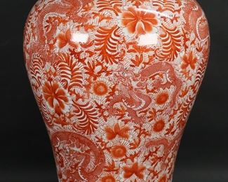         75	Chinese Porcelain Vase Qianlong Style Mark	Chinese porcelain floor vase. Dragon and floral motif in copper red. Red Qianlong style mark to the underside. 21 3/4"H. Imperfection to the base.
