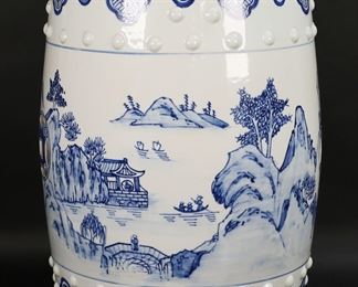         78	Chinese Blue and White Garden Seat	"Chinese blue and white porcelain garden seat. 20th century. Blue and white landscape scenes and vent holes on top and sides. Light scuffs and wear to surface. 

19"" H x 11 3/4"" diameter of top. 32 lbs."
