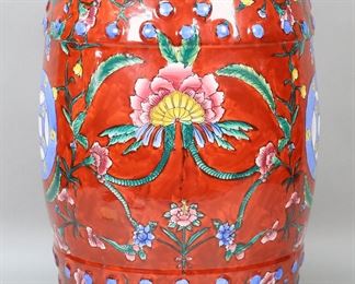         80	Chinese Garden Seat	"Chinese garden seat. 20th century. Terracotta garden seat painted in red with painted floral motifs. Unmarked.  Light scuffs and wear to top of garden seat. 

17 1/4"" H x 11"" diameter of top. 18 lbs."
