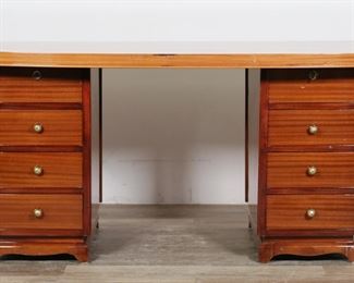        109	French Art Deco Pedestal Desk	"French Art Deco pedestal desk produced by Camard. 20th century. High-gloss finished wood, eight dovetailed drawers, brass pulls, escutcheons, and key. Camard label with ""MADE IN FRANCE"" on underside of top. Scratches, nicks and staining to wood throughout top of desk. Scuffs and marks to wood on drawer fronts and pedestals. Looseness to escutcheons on drawers. Scratches and chip to wood on left and right sides of desk.

71 3/8"" W x 32"" D x 31 1/8"" H.

"

