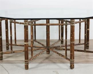        115	Mid Century Modern McGuire Bamboo Dining Table	"Mid Century Modern dining table by the McGuire company (San Francisco, founded 1948). 20th century. Bamboo base, rawhide bindings, octagonal glass top. No maker's marks or labels present. Scratches, scuffs, and wear to glass. Scuffs and wear to bamboo. 

79 7/8"" W x 79 3/4"" D x 29 1/8"" H."

