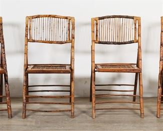        122	Four Chinese Bamboo Folding Chairs	"Four Chinese bamboo folding chairs. Late 20th century. Bentwood bamboo frames and seating. ""MADE IN CHINA"" labels on top of each chair on top rail. Separation to wood on frame on seat of one chair. Loss to wood on seat frame below separation. Wear and scuffs throughout bamboo on all chairs. 

Closed:  18 1/4"" W x 3 1/2"" D x 38 3/4"" H. 18 1/2"" W x 24"" D x 36"" H. 
"


