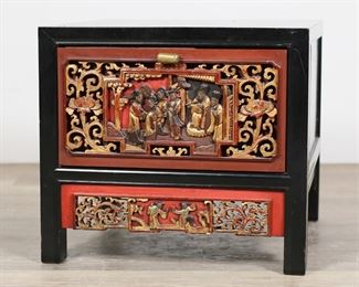        123	Chinese Lacquered Figural Carved Side Table	"Chinese lacquered figural carved side table. Hong Kong, 20th century. One drawer, drawer front and apron carved with figural courtier scenes. J.J. George and Co. label on back of table. Heavy scratches, nicks, and wear to wood to top of table. Scratches and chips to wood on edges of feet. Loss to wood to top edge of drawer. Scuffs and marks to wood on left and right sides of table. 

17 7/8"" W x 18"" D x 16"" H"

